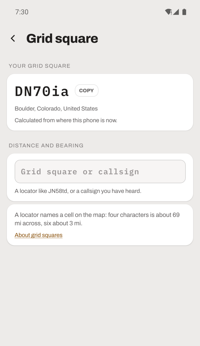 The Grid square screen: the phone's own six-character locator, large enough to read out, with a copy button.