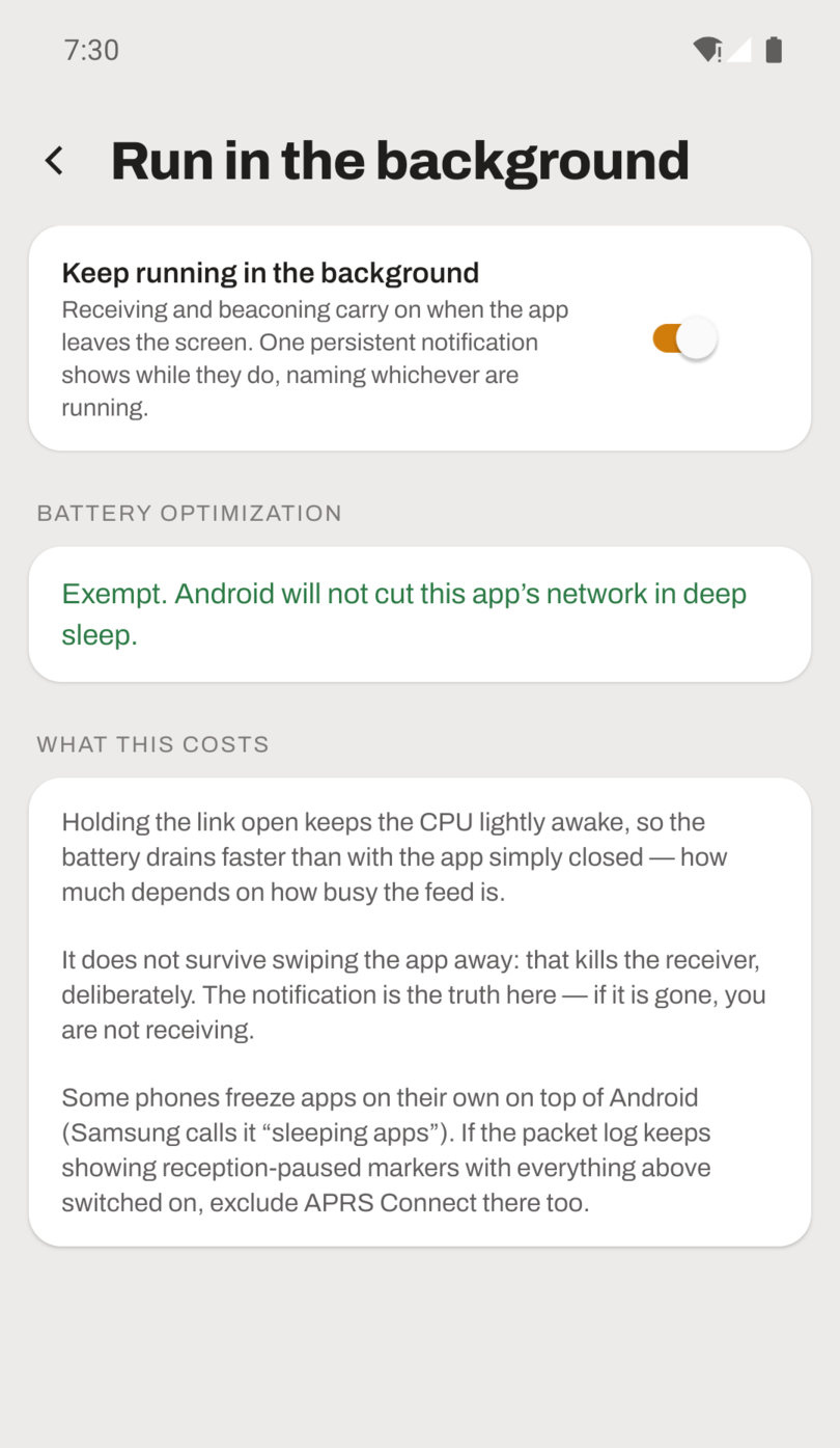 The Run in the background screen in APRS Connect. The Keep running in the background switch is on. Below it, a Battery optimization section reads "Exempt. Android will not cut this app's network in deep sleep." and a What this costs section follows.